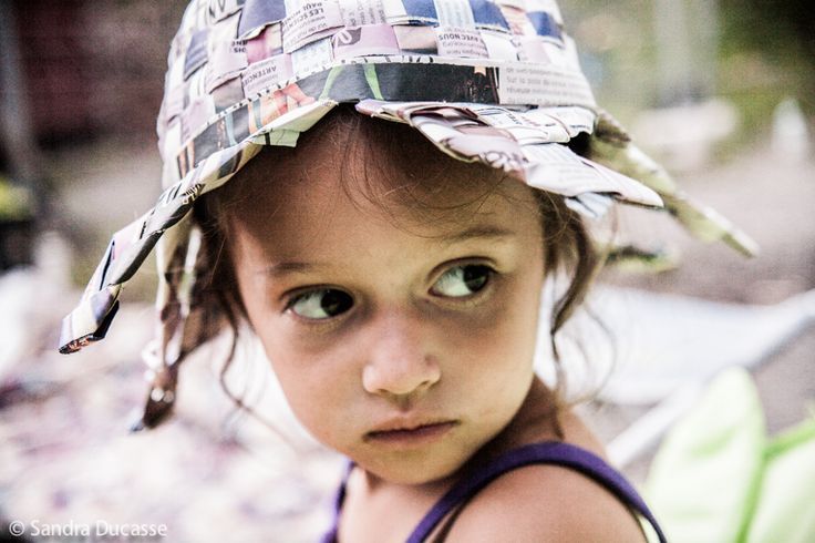 Anna my daughter, with a home-made hat! 